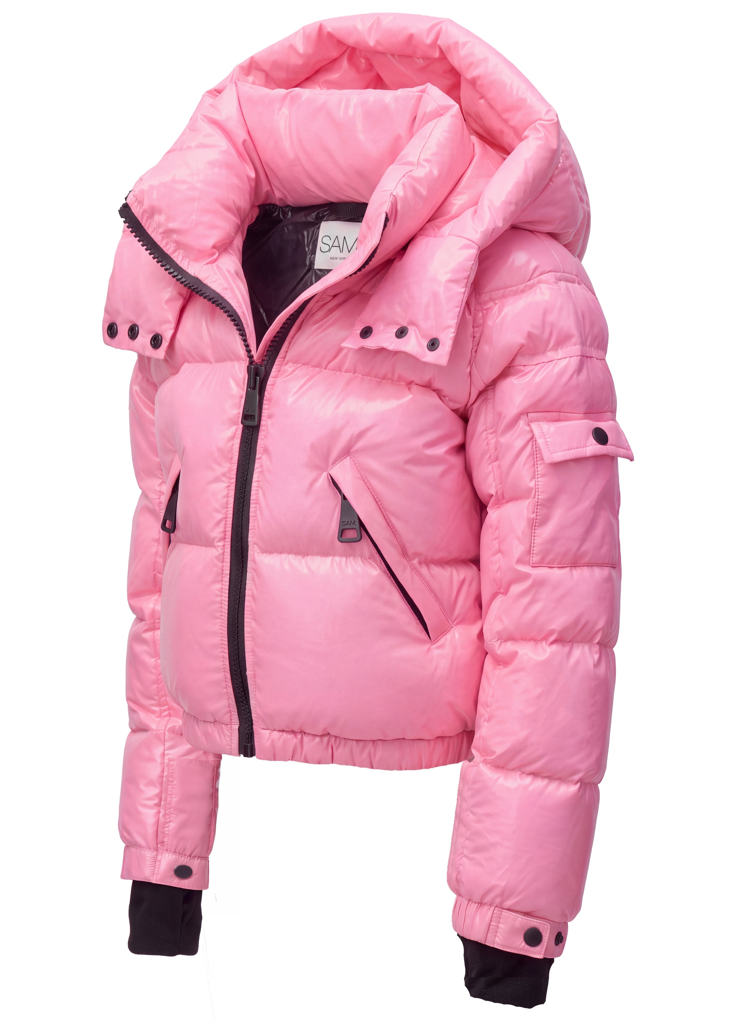 GIRLS CROPPED FREESTYLE A pink puffer jacket with a high collar, black zipper, and black cuff details, shown against a plain white background.