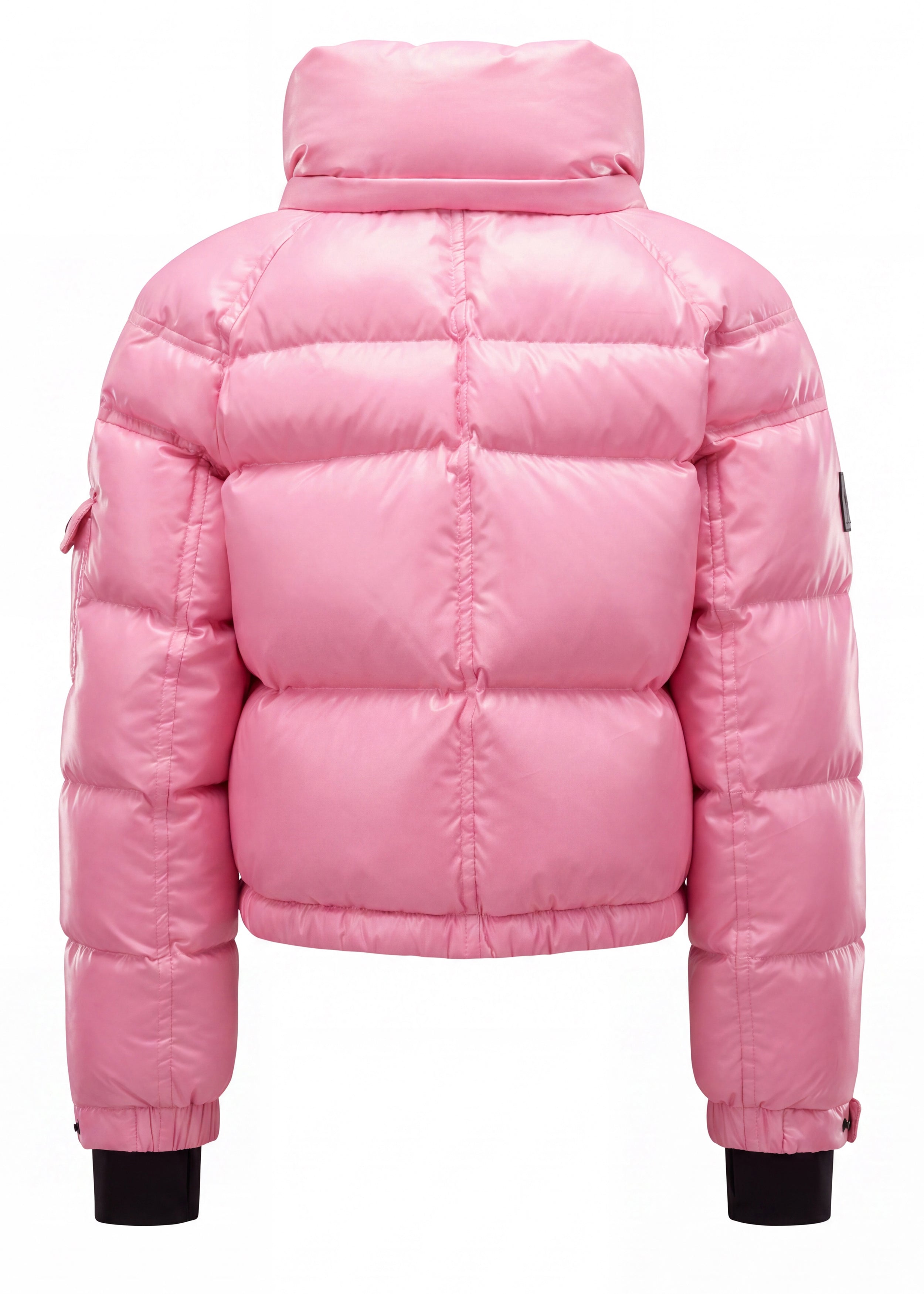 GIRLS CROPPED FREESTYLE A shiny pink puffer jacket shown from the back, featuring horizontal quilting, a high padded collar, and black ribbed cuffs, set against a plain white background.